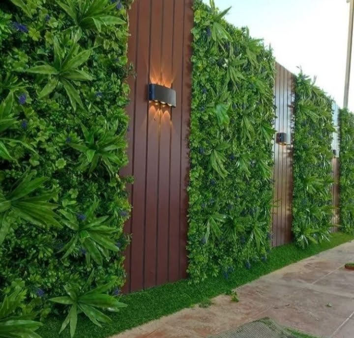 تنسيق حدائق الاحساء وتركيب العشب الصناعي